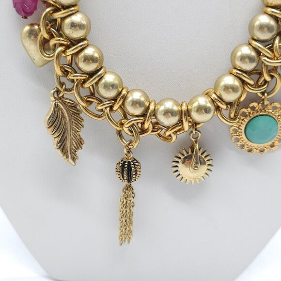 JESSICA SIMPSON Gold Tone Bead Heart Flower Feather Tassel Charm 19" Necklace - Picture 3 of 8